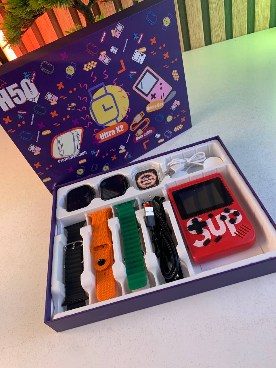 Pack 2 Smartwatch Ultra X2 avec 7 Bracelets et SUP Gamebox 400 Jeux – طقم ساعتين ذكيتين مع جهاز ألعاب كلاسيكية